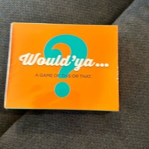 Would’ya… Card Game. A game of This or That. New in sealed box.